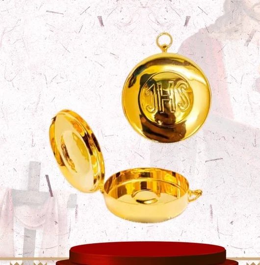 Chalice, ciborium and paten in gold and silver plate